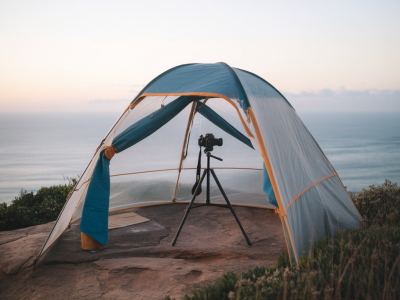 How to rig a lightweight, waterproof camera shelter from a tarpaulin for dawn cliff-top seascapes